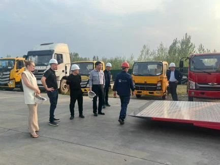 Spanish customers come to inspect the tow truck